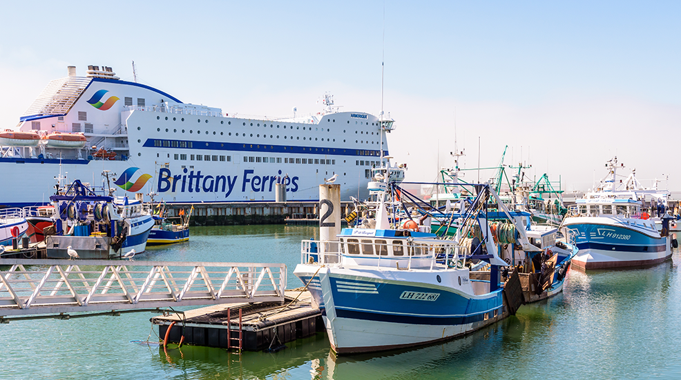 Trawlers and Brittany Ferries ferry boat in the port of Le Havre